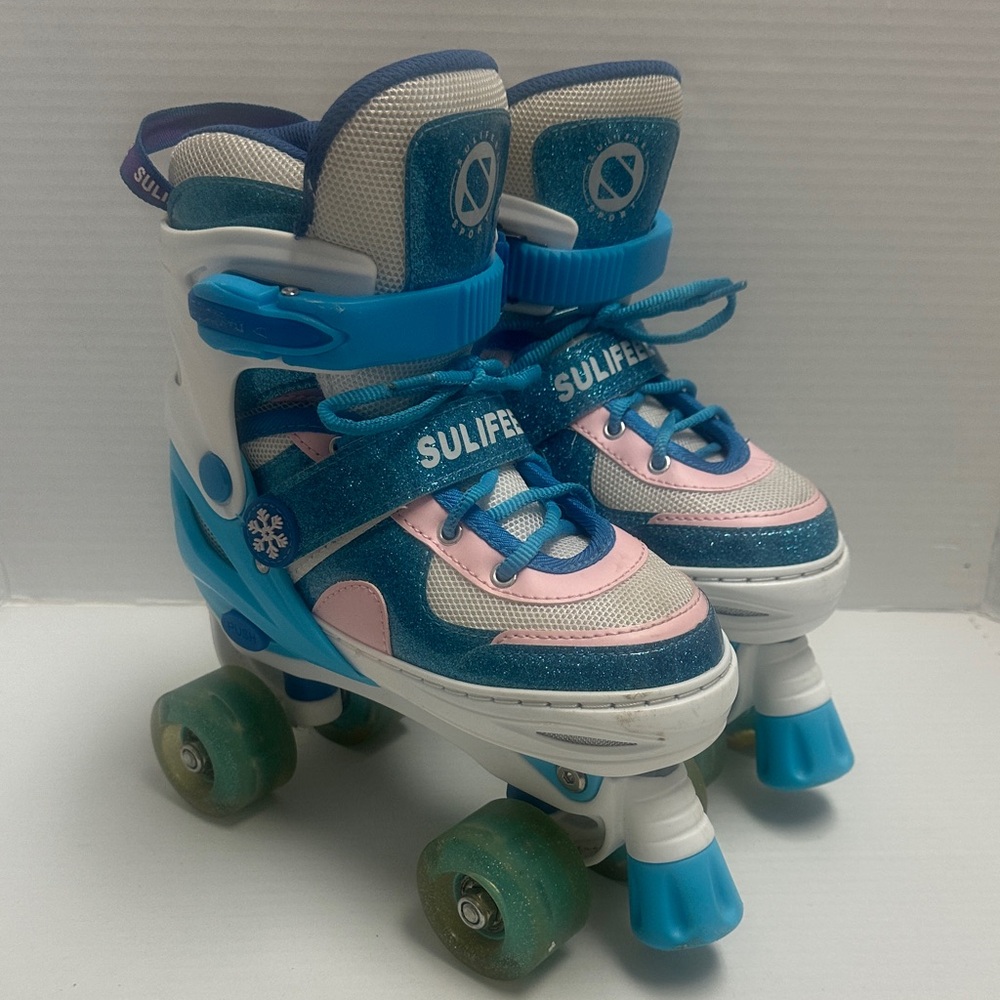 Blue and Pink Roller Skates
